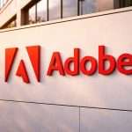 Adobe stock price sinks nearly 5% as Jefferies cuts target to $290 and tariff jitters hit software