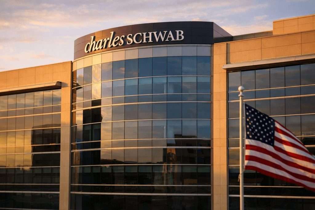 Charles Schwab stock rises late in the session as Fed minutes reshape rate bets