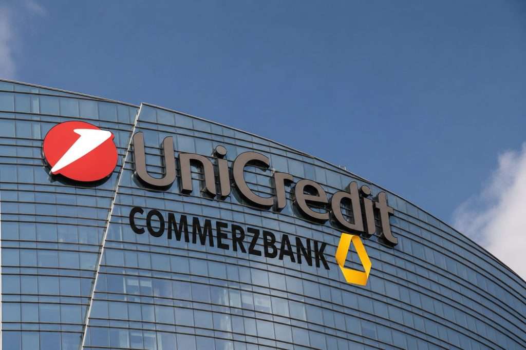 Commerzbank-UniCredit Takeover Fight Moves to Brussels as German Resistance Draws ECB Fire