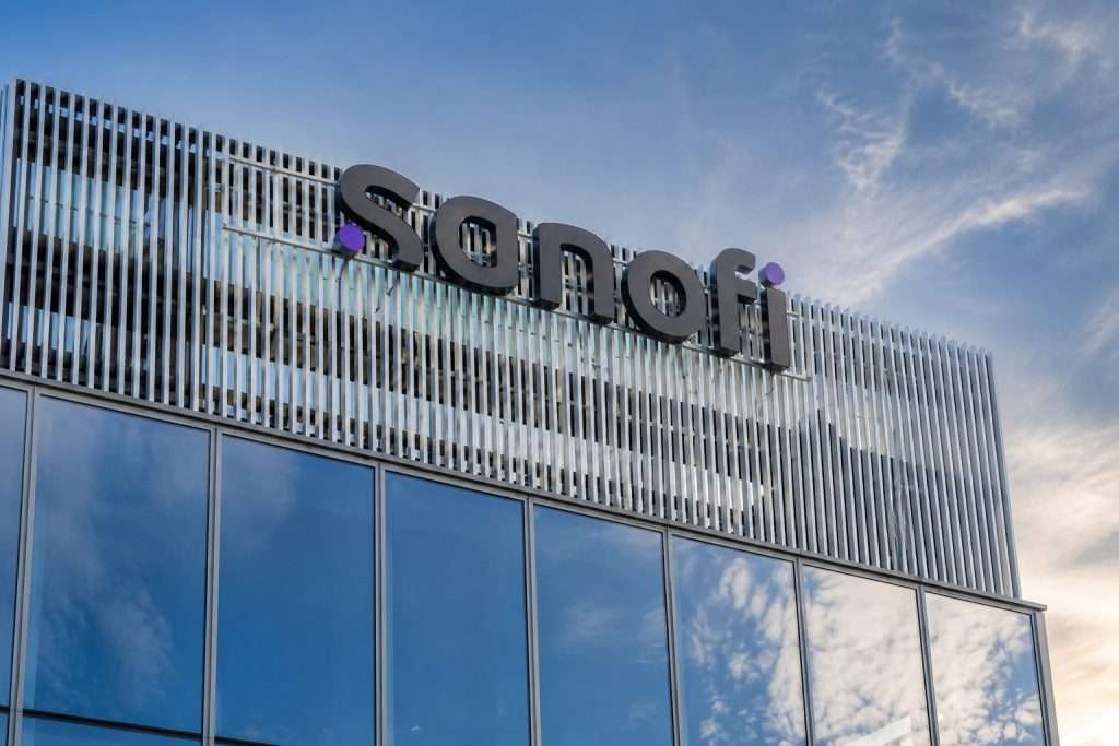 Sanofi Shares Trail Paris Gains as Traders Keep Watch