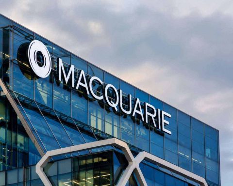 Macquarie Slips as Budget Risk Cools a Record-High Rally