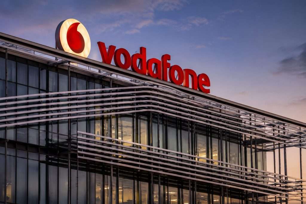 Vodafone Share Price Slips After Earnings: Three UK Deal and UBS Sell Call Raise the Stakes