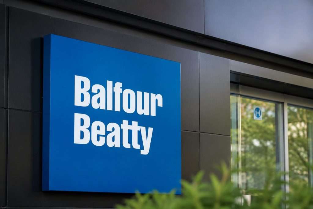 Balfour Beatty trades below FTSE 250 even as buyback crosses halfway at near-record prices