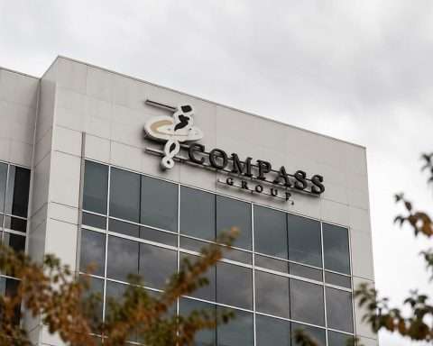 Compass Group trades around $32 with valuation at 1.1x 2026 sales after dollar switch