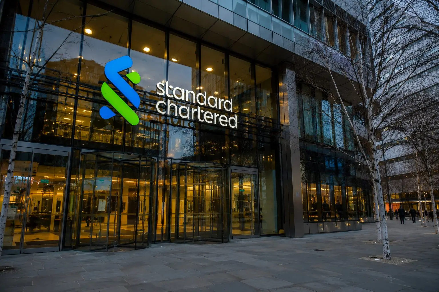 Standard Chartered Stock Climbs; Buyback Support Puts Attention on July Results