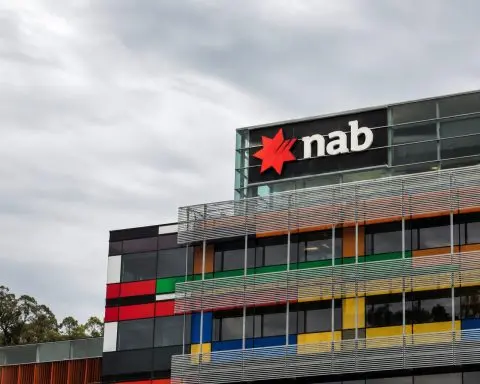 NAB Shares Climb With ASX; Traders Watch RBA Decision