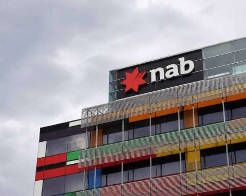 NAB shares edge up after deposit hedge balances loan margin hit