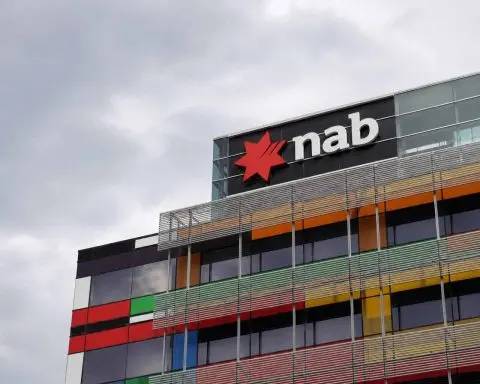 NAB shares edge up after deposit hedge balances loan margin hit