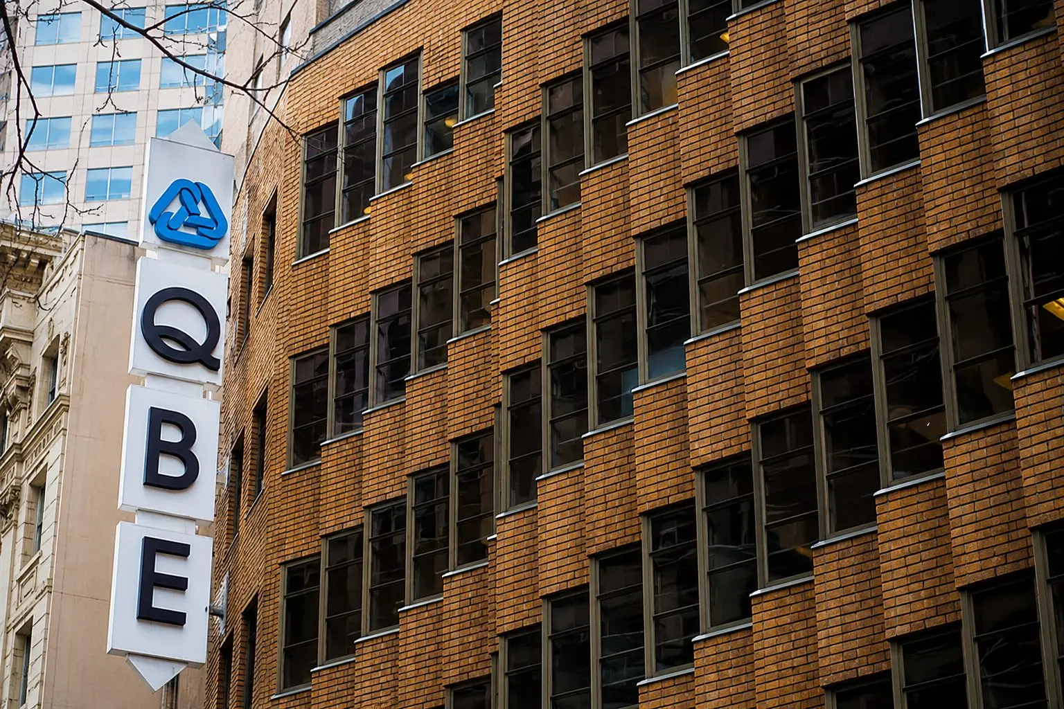 QBE Insurance (ASX:QBE) trades close to 52-week peak as June half wraps up
