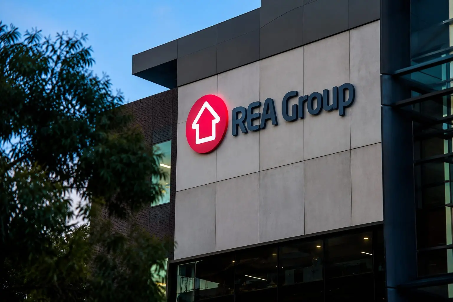 REA Group (ASX:REA) holds near lows as weak auctions hit, buyback gap lingers