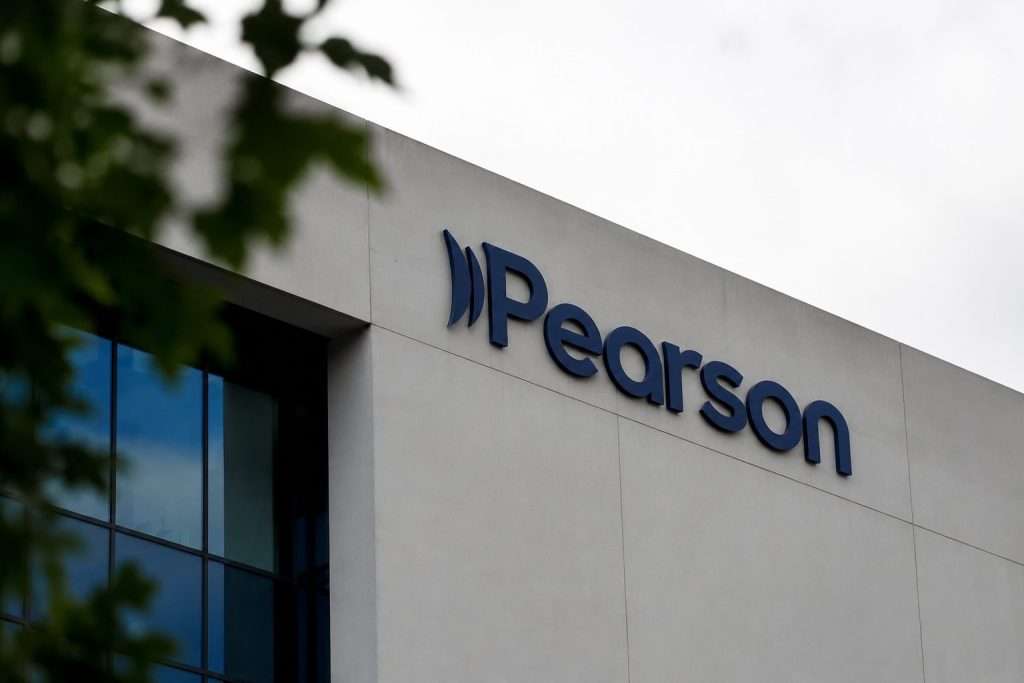 Pearson (LON:PSON) hits 52-week high after UK regulator skips fine