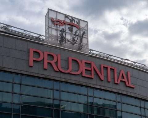 Prudential trades lower while shares buyback tops market price
