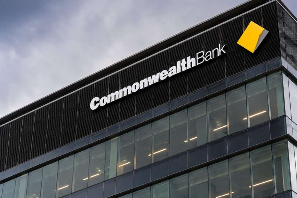 Commonwealth Bank stock rises as ASX falls, premium valuation faces rate test