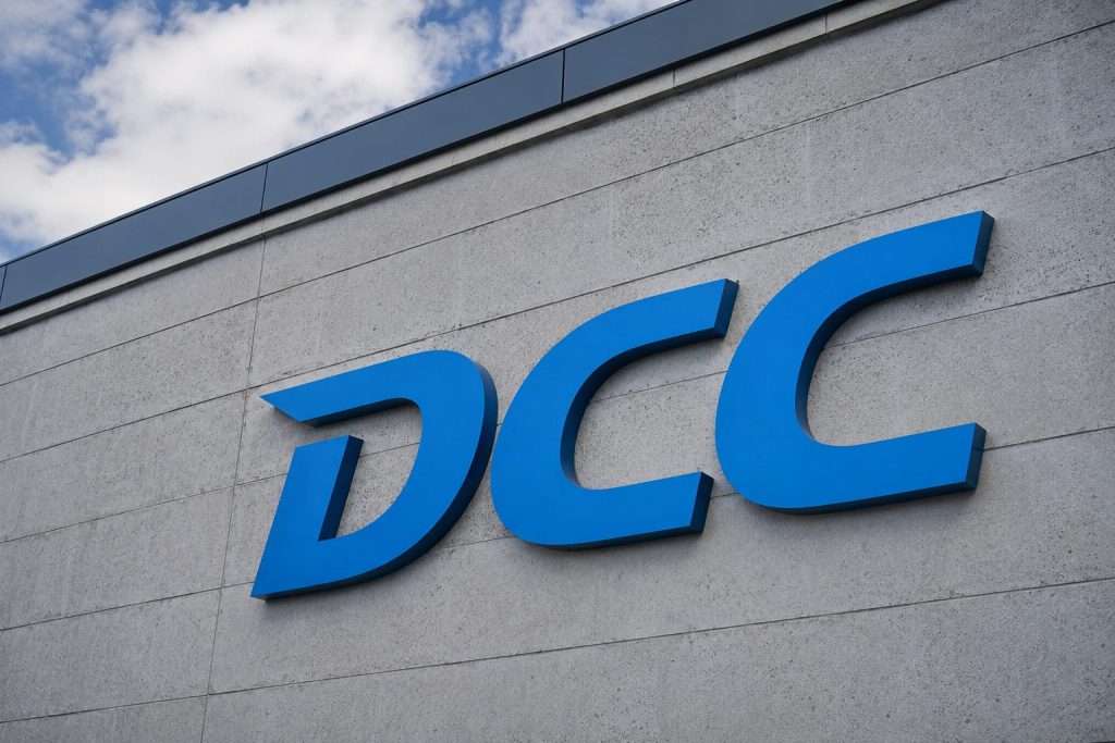 DCC (LON:DCC) share price holds below offer cash leg as spread widens