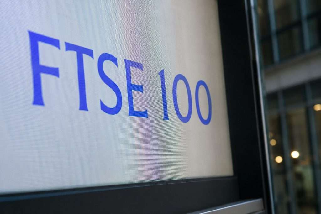 FTSE 100 edges up, but UK mid-caps slide after credit worries